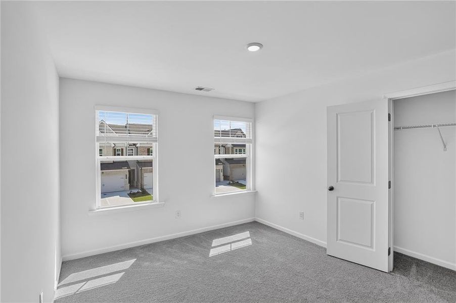 Spacious, unfurnished interior of a new home in Towns at Ivy Creek, Buford (Image 17).