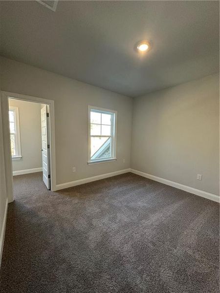 Spacious, unfurnished interior of a new home in Mirror Lake at South Harbour, Villa Rica (Image 47).