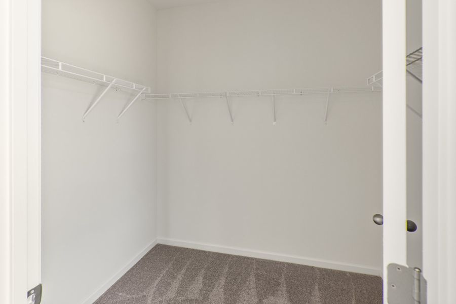 Spacious, unfurnished interior of a new home in The Exchange, Vass (Image 21).