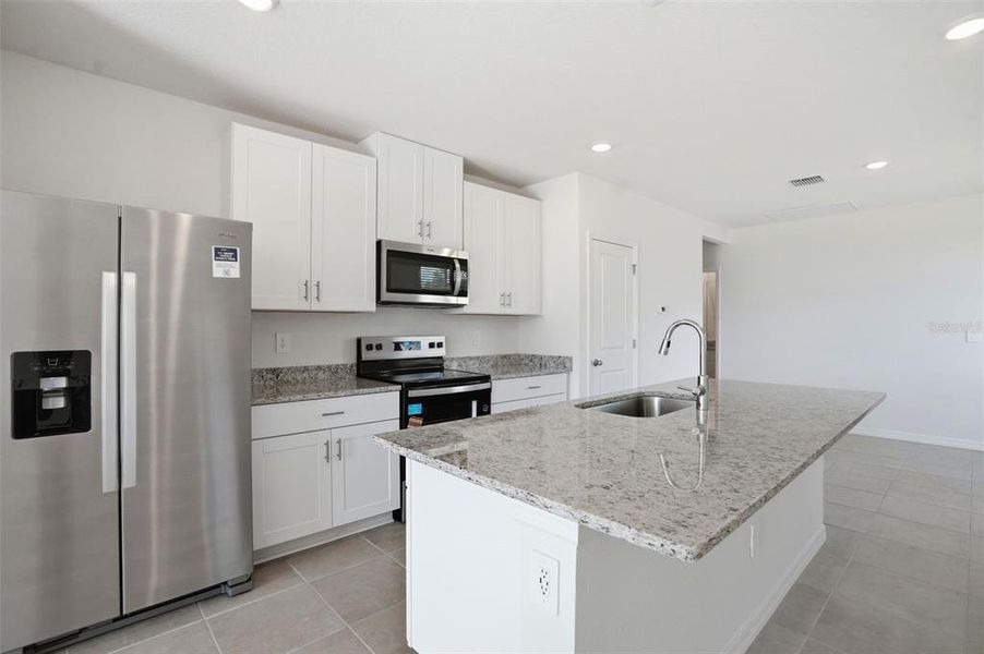 Furnished interior view inside a new home in Leyland Preserve - Premier Series, Brooksville (Image 9).