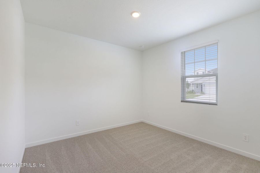 Spacious, unfurnished interior of a new home in Lakes at Bella Lago - Signature Series, Green Cove Springs (Image 27).