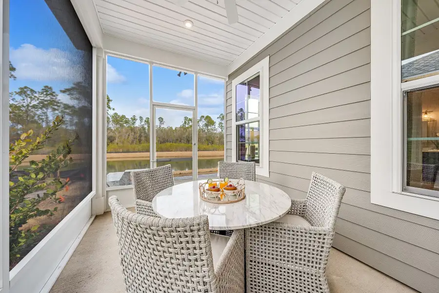 Exterior details and patio area of a home in The Villas at Longleaf Park, a Watersound Origins® community, Inlet Beach (Image 3).