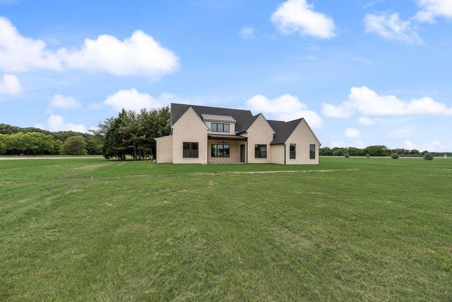 Front exterior of a new home in , Corsicana, TX, highlighting curb appeal (Image 1). Front exterior of a new home in , Corsicana, TX, highlighting curb appeal (Image 1).