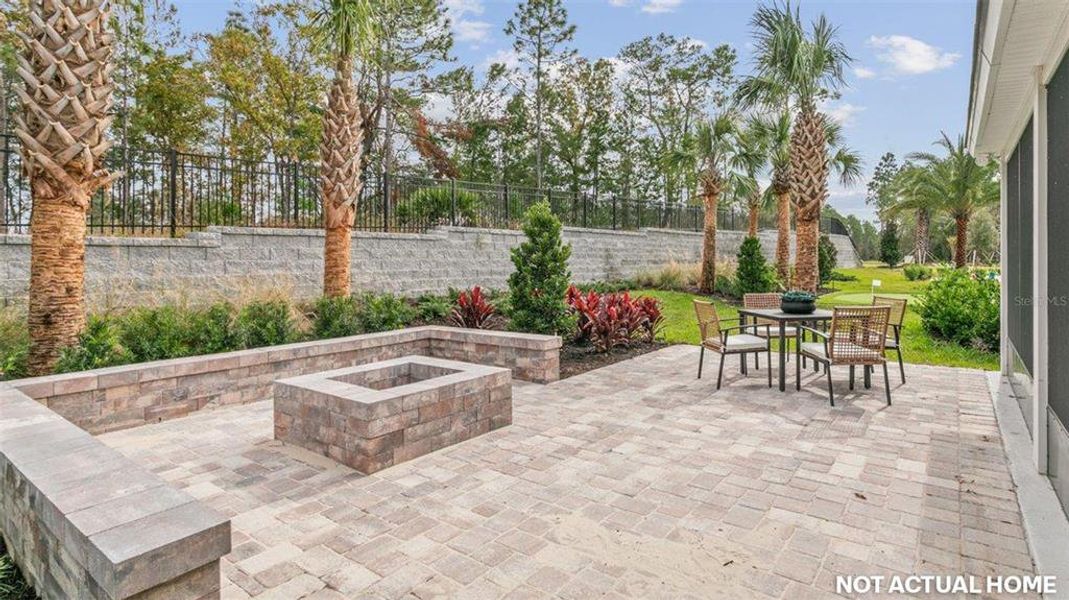 Exterior details and patio area of a home in Sawmill Branch, Palm Coast (Image 27).