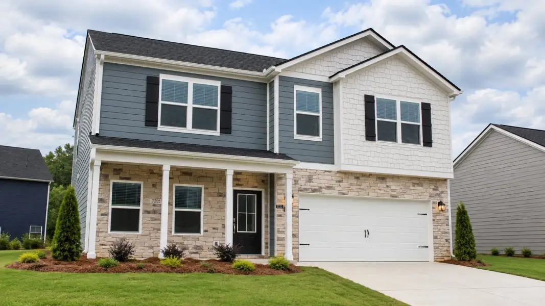 Front exterior of a new home in The Hideaway at Edgestone, Ooltewah, TN, highlighting curb appeal (Image 2). Front exterior of a new home in The Hideaway at Edgestone, Ooltewah, TN, highlighting curb appeal (Image 2).