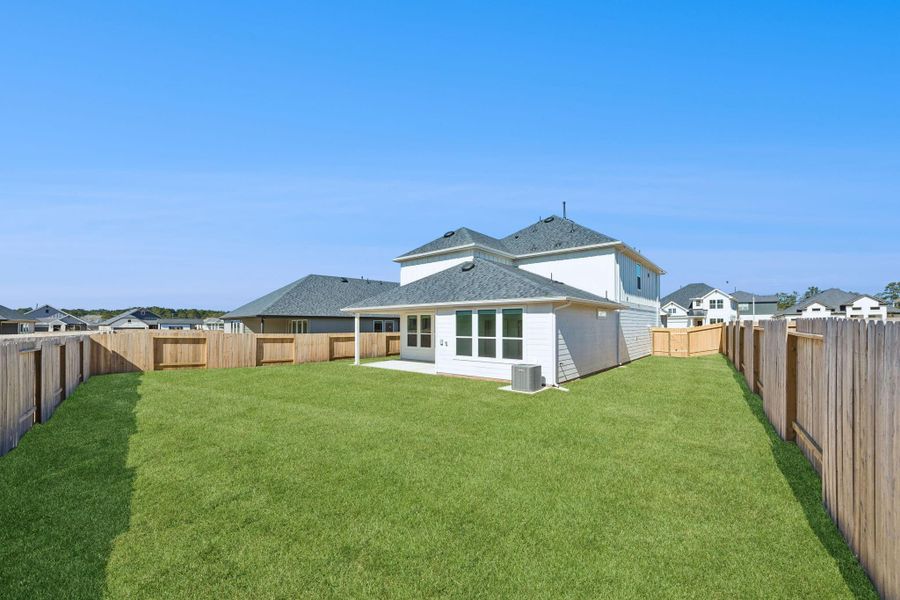 Exterior details and patio area of a home in Montgomery Bend, Montgomery (Image 4).