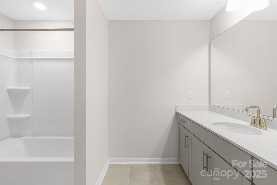 Furnished interior view inside a new home in Sylvan Creek, Denver (Image 27).