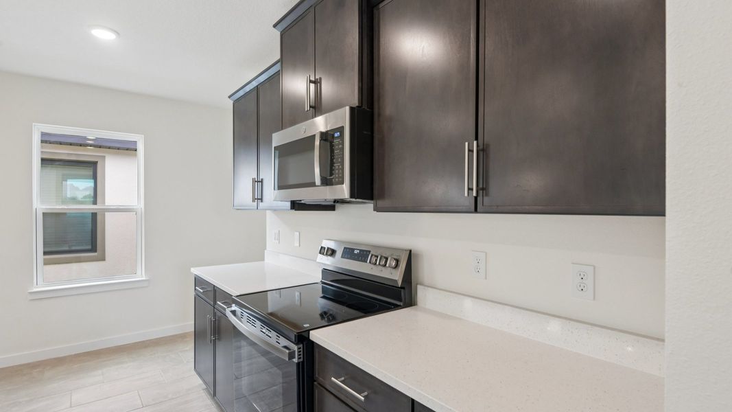 Furnished interior view inside a new home in Grasslands West, Lakeland (Image 12).