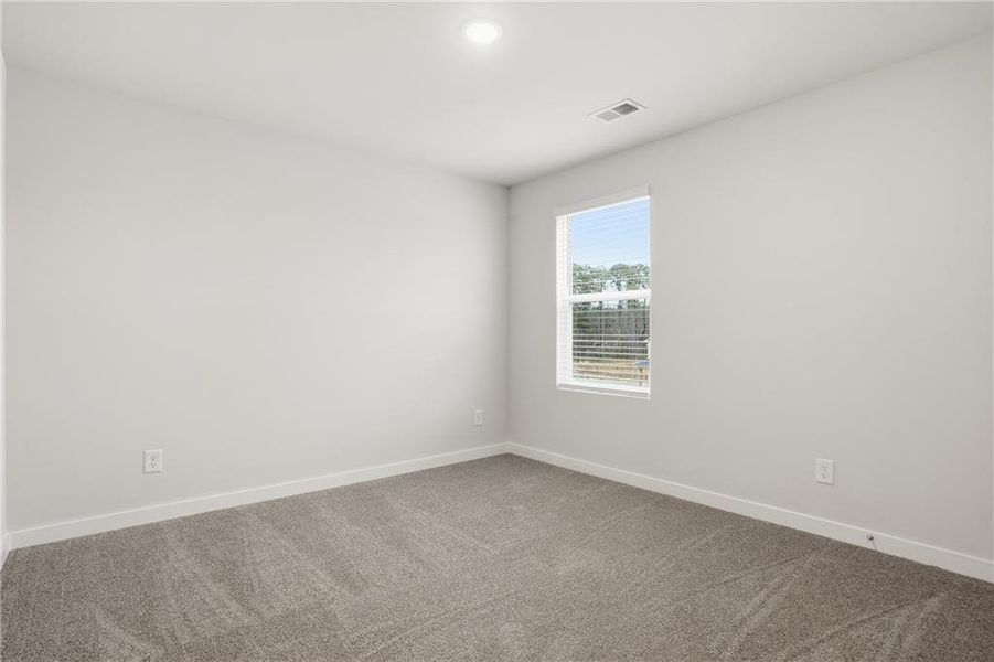 Spacious, unfurnished interior of a new home in Fern Dale, Fairburn (Image 25).