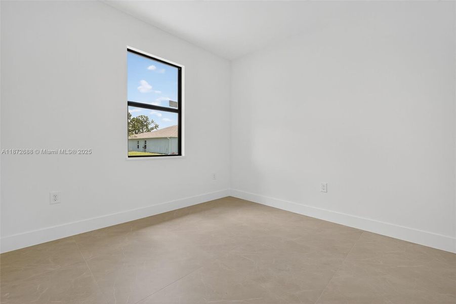 Spacious, unfurnished interior of a new home in , Lehigh Acres (Image 15).
