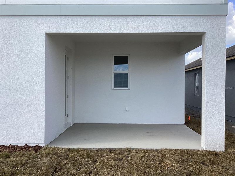 Exterior details and patio area of a home in Catamaran Cove, Rockledge (Image 4).