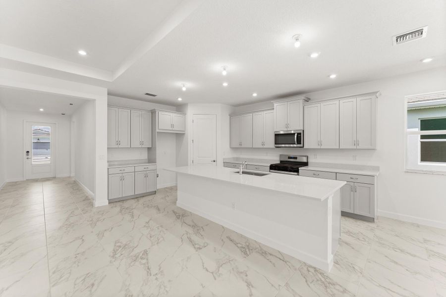 Furnished interior view inside a new home in Tradition - Telaro, Port St. Lucie (Image 6).