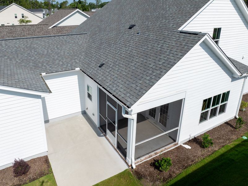 Front exterior of a new home in Osprey Landing, Southport, NC, highlighting curb appeal (Image 28).