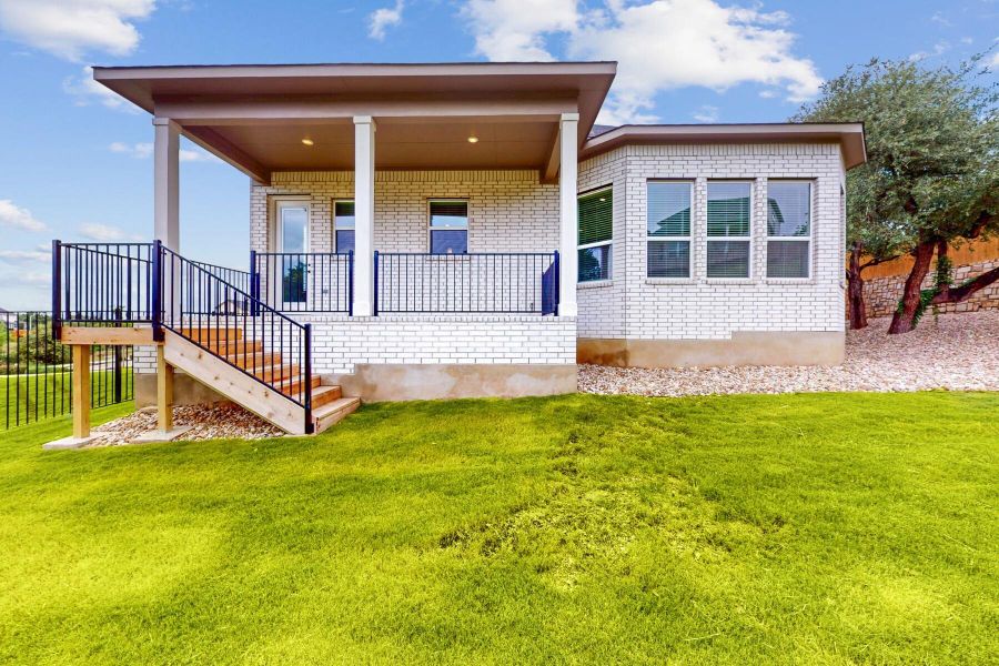 Front exterior of a new home in Edgewood, Leander, TX, highlighting curb appeal (Image 1).