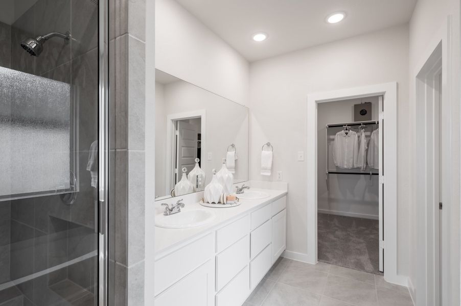 Representative furnished interior of a home built from the Caddo by Tri Pointe Homes in Mason Woods, Cypress (Image 5).