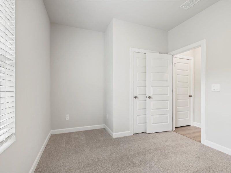 Spacious, unfurnished interior of a new home in Waterside - Boardwalk Series, Longs (Image 16).