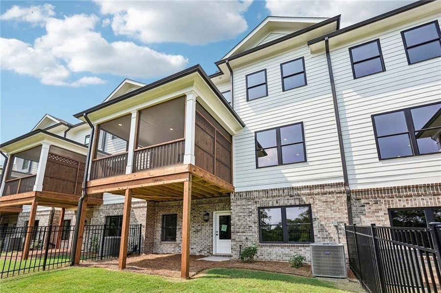 Exterior details and patio area of a home in Millcroft Townhomes, Buford (Image 33).