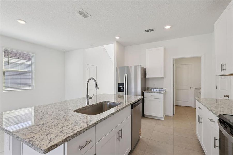 Furnished interior view inside a new home in Flagler Village - Classic Series, Palm Coast (Image 9).