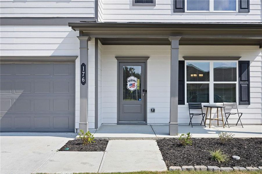 Front exterior of a new home in , Dallas, GA, highlighting curb appeal (Image 19).