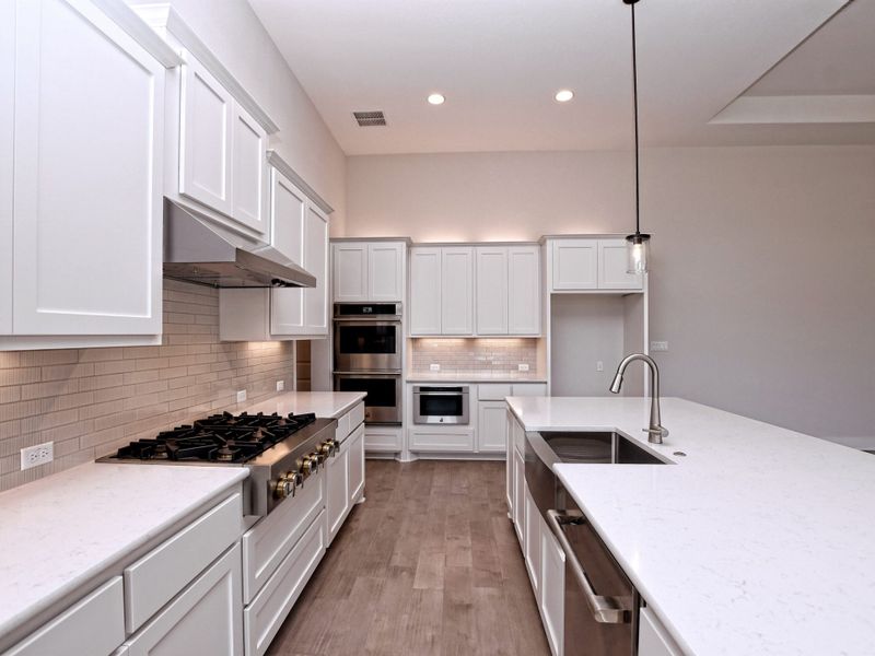 Representative furnished interior of a home built from the Emerald II by Giddens Homes in Riverstone, Georgetown (Image 6).