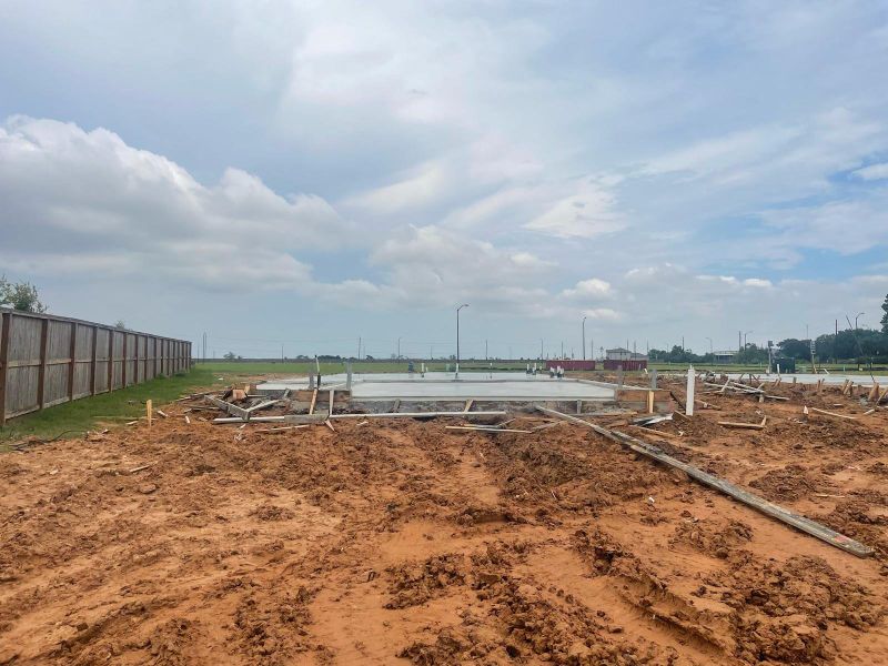 Front exterior of a new home in Laurel Farms, Brookshire, TX, highlighting curb appeal (Image 2). Front exterior of a new home in Laurel Farms, Brookshire, TX, highlighting curb appeal (Image 2).