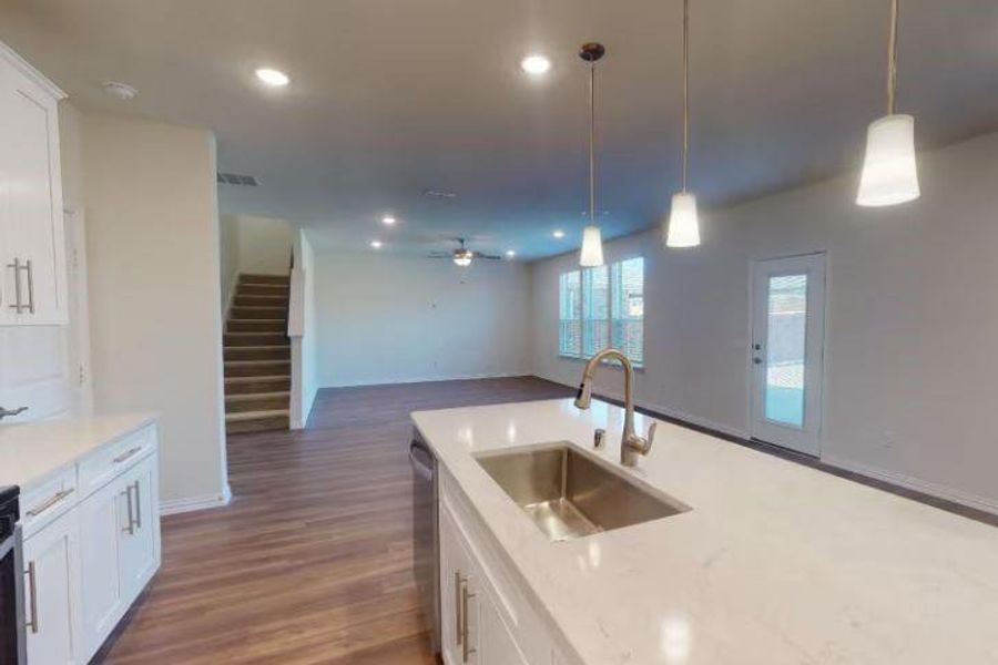 Photo of Pulte home with same floor plan, not of actual home listed.