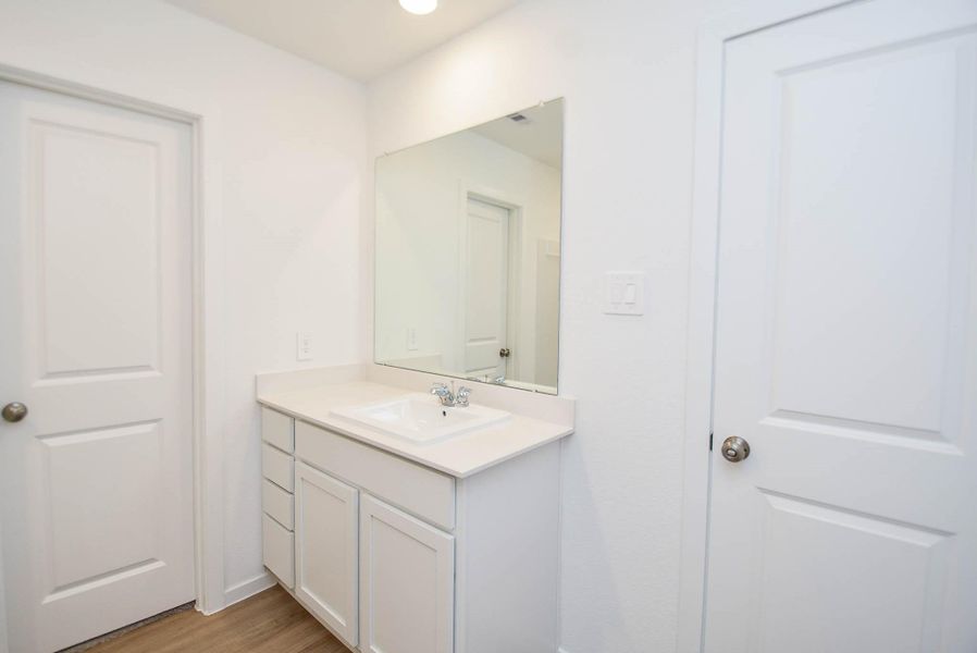 Furnished interior view inside a new home in Ladera Trails, Conroe (Image 7).