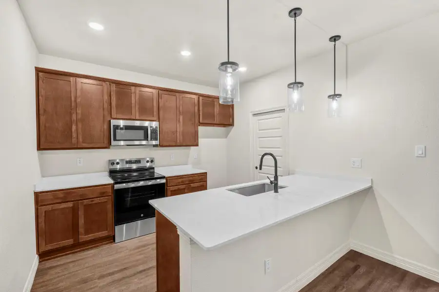 Furnished interior view inside a new home in , Killeen (Image 6).