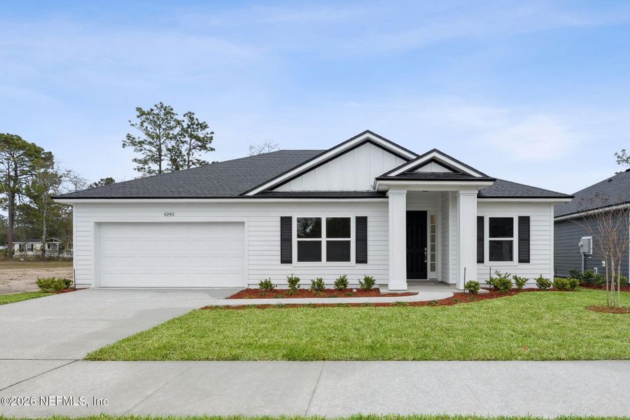 Front exterior of a new home in , Jacksonville, FL, highlighting curb appeal (Image 1). Front exterior of a new home in , Jacksonville, FL, highlighting curb appeal (Image 1).