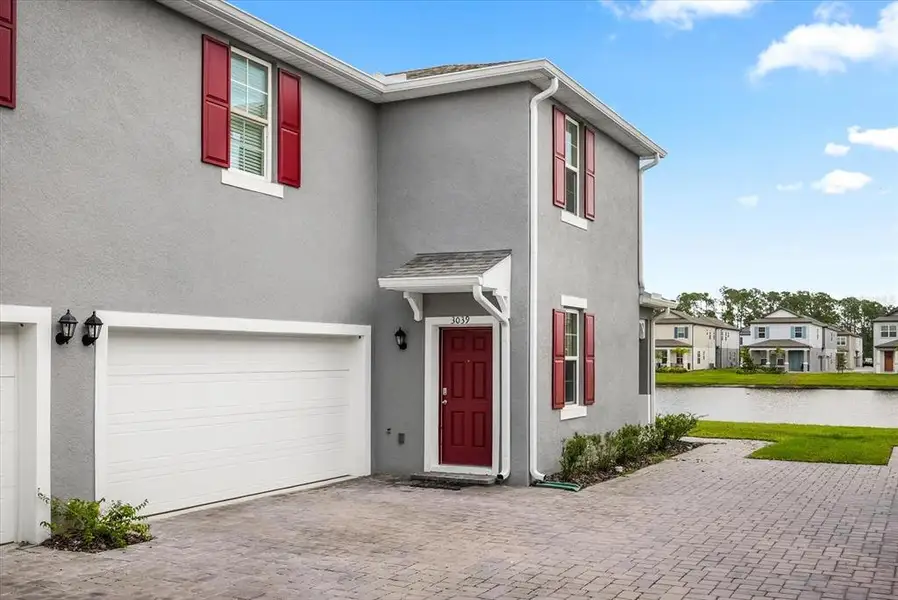 Front exterior of a new home in , New Smyrna Beach, FL, highlighting curb appeal (Image 17). Front exterior of a new home in , New Smyrna Beach, FL, highlighting curb appeal (Image 17).