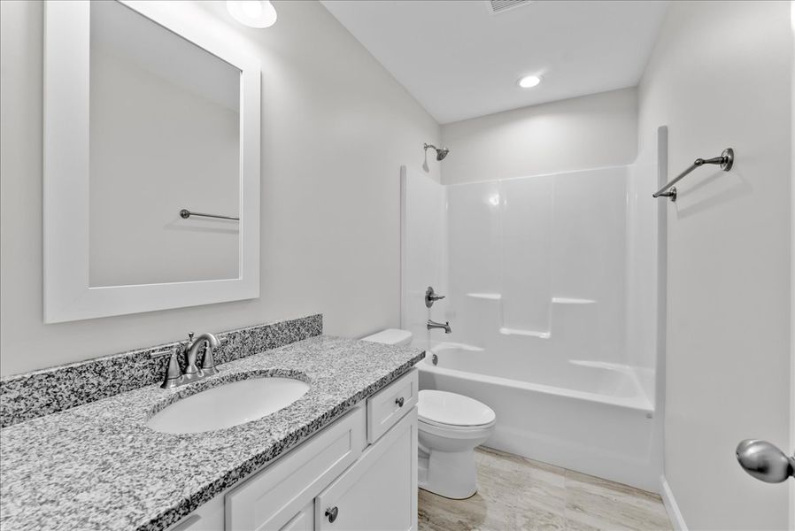 Representative furnished interior of a home built from the Addington by Enchanted Homes in Ballentine Ridge, Lyman (Image 18).