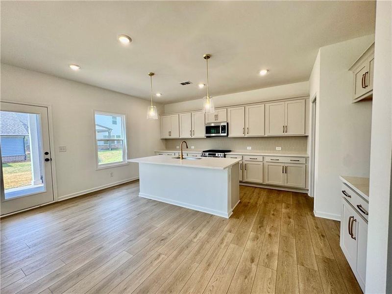 Furnished interior view inside a new home in Eastlyn Crossing, Flowery Branch (Image 8).