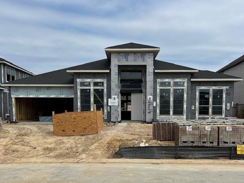 The Amalfi 3 is an elegant brick and stucco home with 4 bedrooms, 4.5 bathrooms and a 3-car garage.