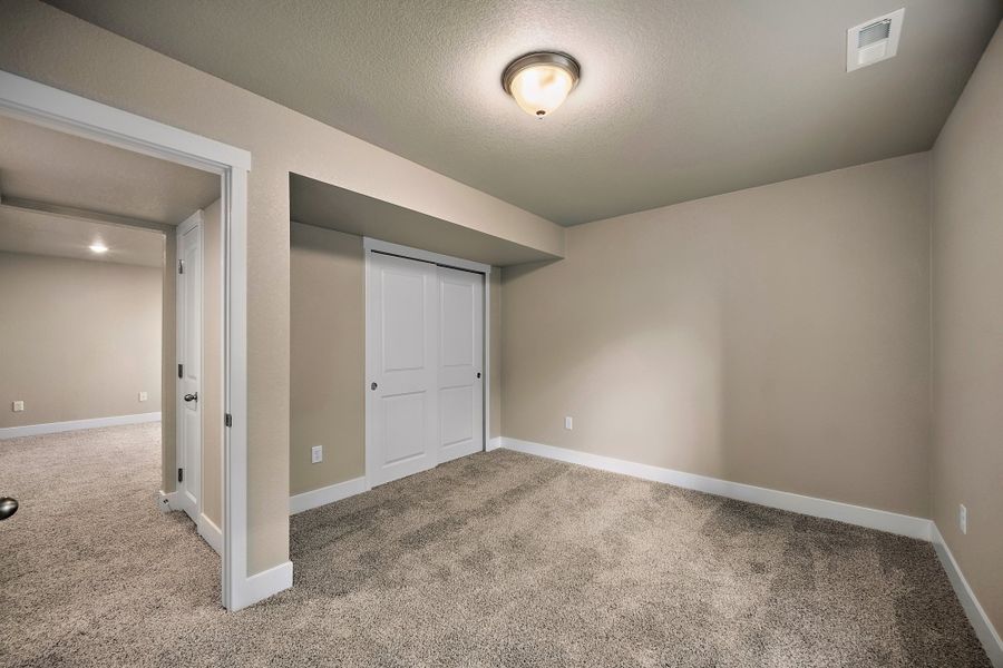 Spacious, unfurnished interior of a new home in Ridge at Lorson Ranch, Colorado Springs (Image 34).