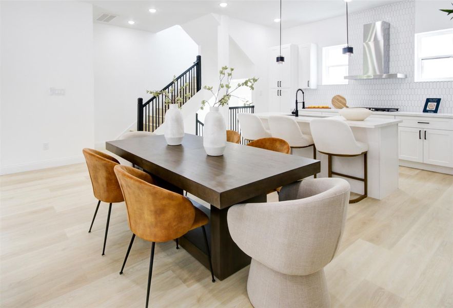 Imagine entertaining friends and family here while you cook a lovely meal.