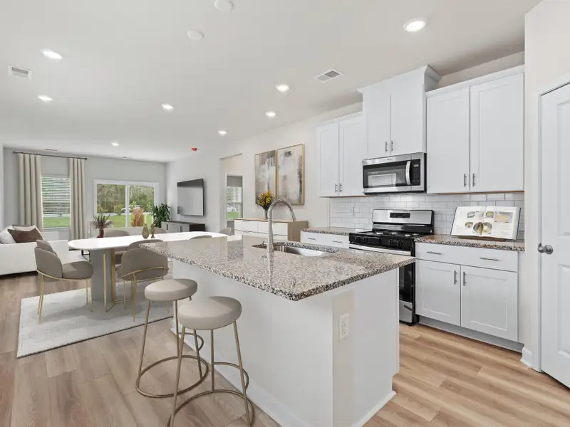 Furnished interior view inside a new home in Russell Grove - Willows Series, Charlotte (Image 3).