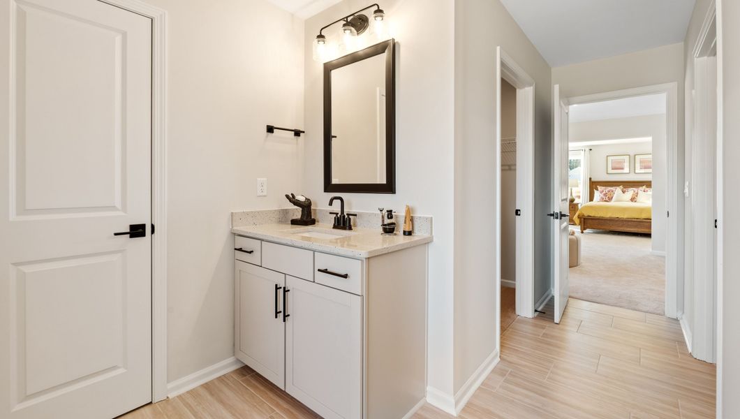 Representative furnished interior of a home built from the Graymount by D.R. Horton in Hunters Creek, Greenwood (Image 36).