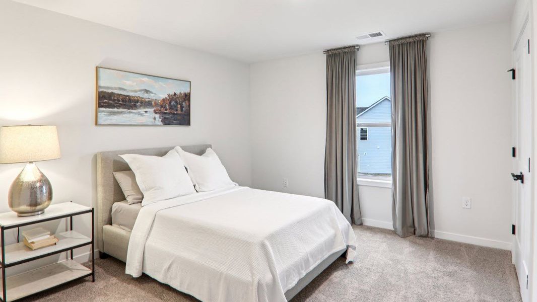 Furnished interior view inside a new home in Reserve at Tap Root Farms, Fletcher (Image 27).