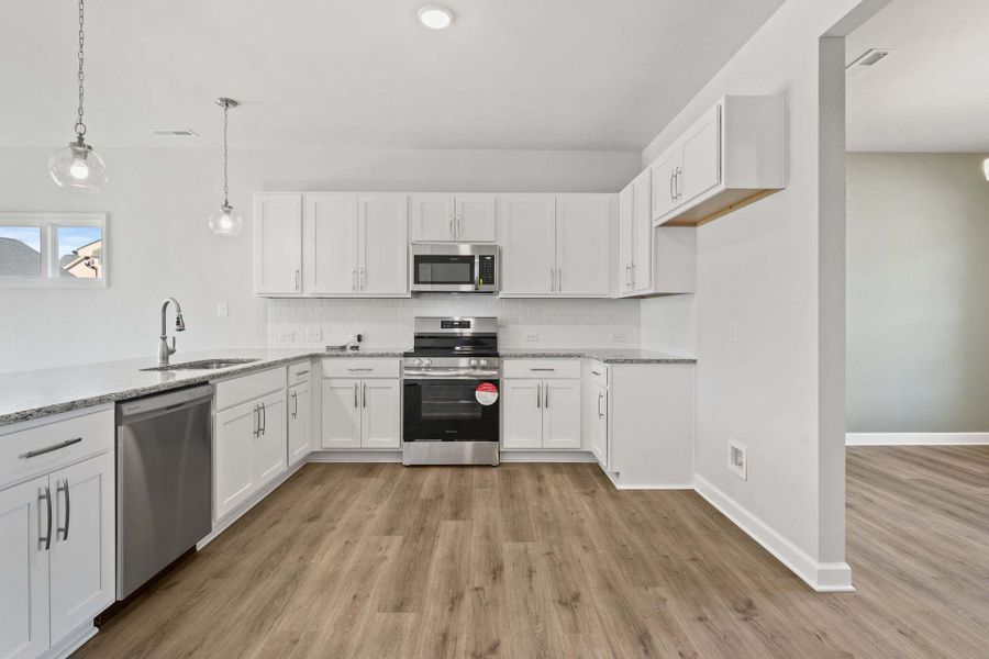 Representative furnished interior of a home built from the Camellia by Caviness & Cates Communities in Bartlett Manor, Youngsville (Image 77).