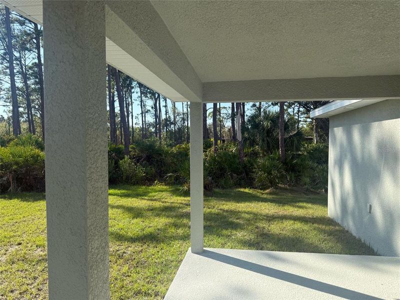 Exterior details and patio area of a home in Port Charlotte, Port Charlotte (Image 3).