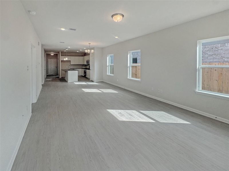 The Piedmont- Family Room into the Dining Area and Kitchen.