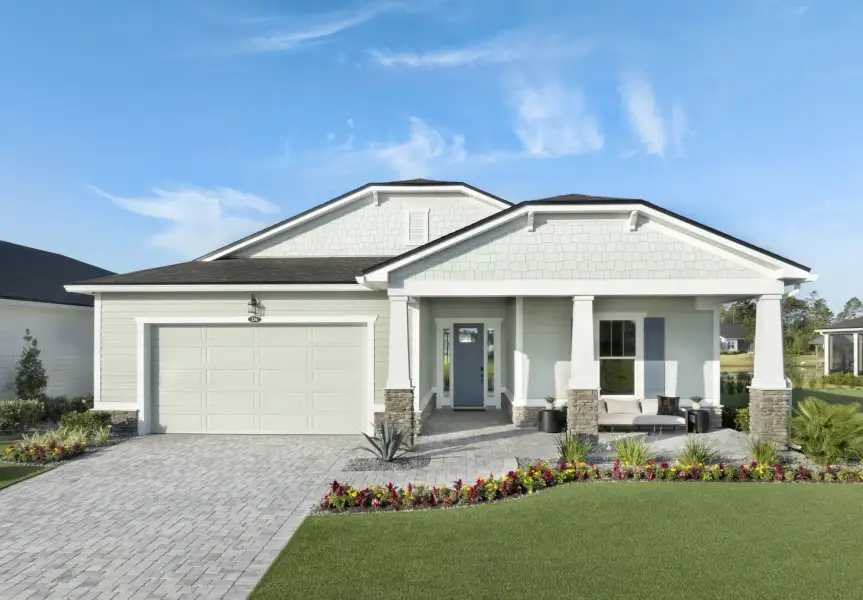 Front exterior of a new home in RiverTown, St. Johns, FL, highlighting curb appeal (Image 2). Front exterior of a new home in RiverTown, St. Johns, FL, highlighting curb appeal (Image 2).