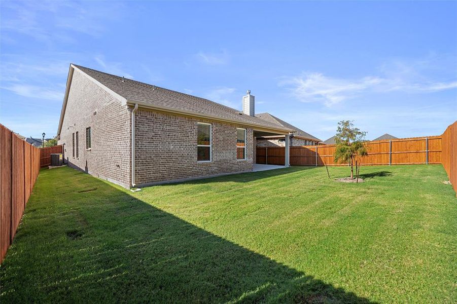 Exterior details and patio area of a home in Morningstar, Aledo (Image 19). Exterior details and patio area of a home in Morningstar, Aledo (Image 19).