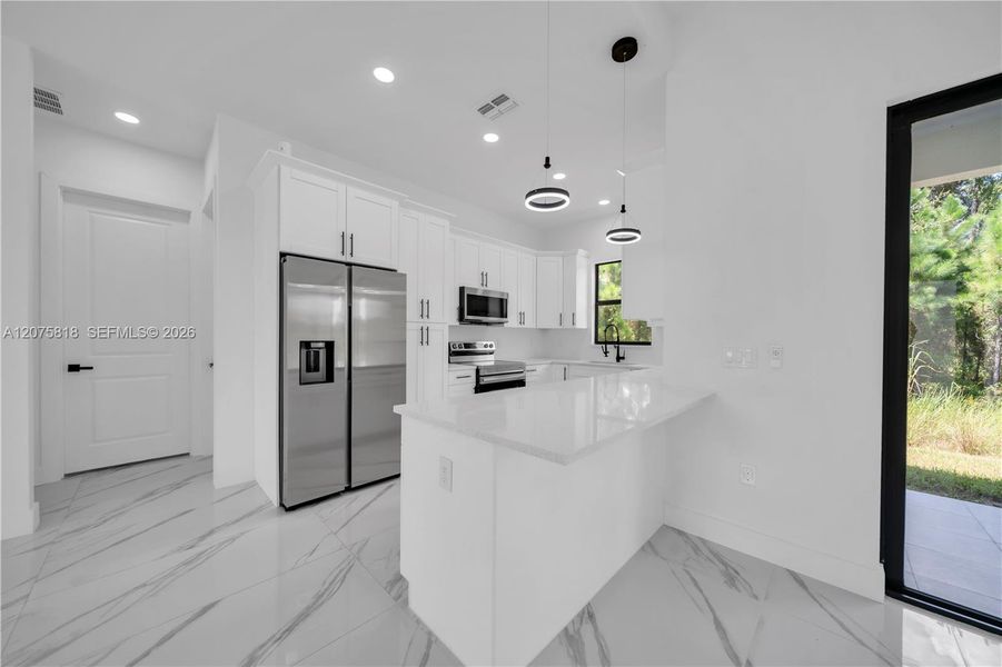 Furnished interior view inside a new home in , Lehigh Acres (Image 7).
