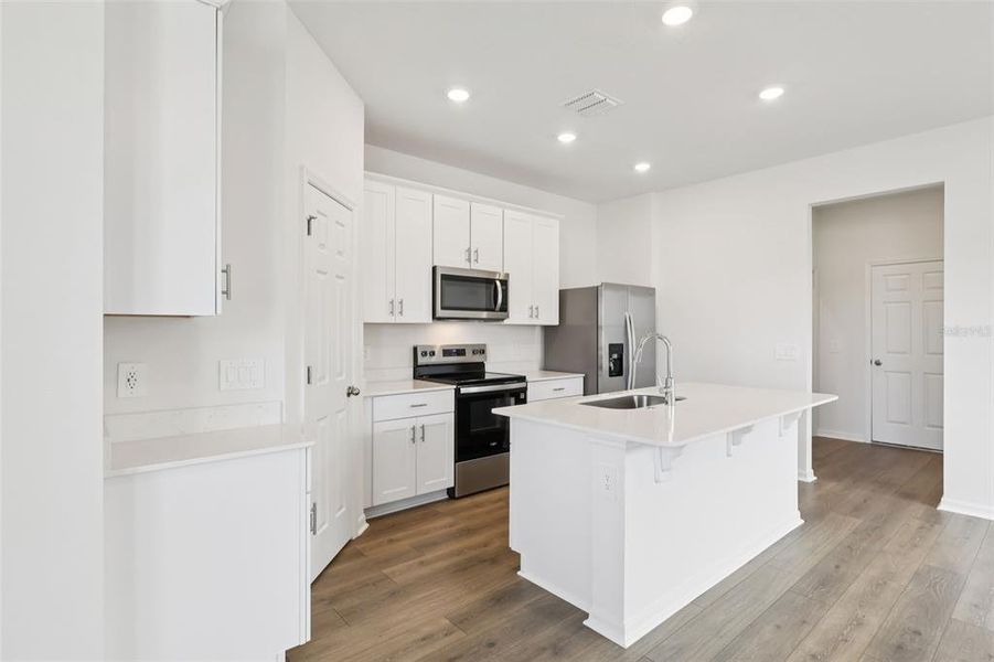 Furnished interior view inside a new home in The Meadow at Crossprairie Bungalows, St. Cloud (Image 10).