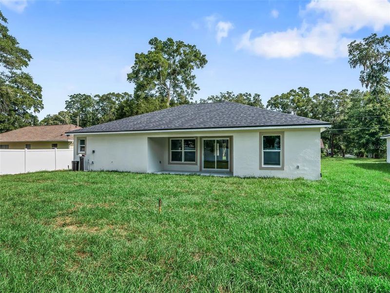 Exterior details and patio area of a home in , Ocala (Image 27).