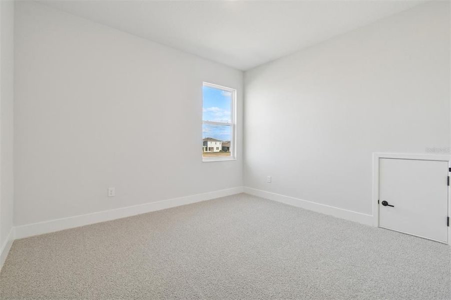 Spacious, unfurnished interior of a new home in Waterset Tradition Series, Apollo Beach (Image 19).