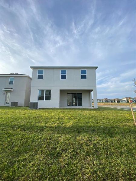 Exterior details and patio area of a home in Park View at the Hills, Minneola (Image 2).