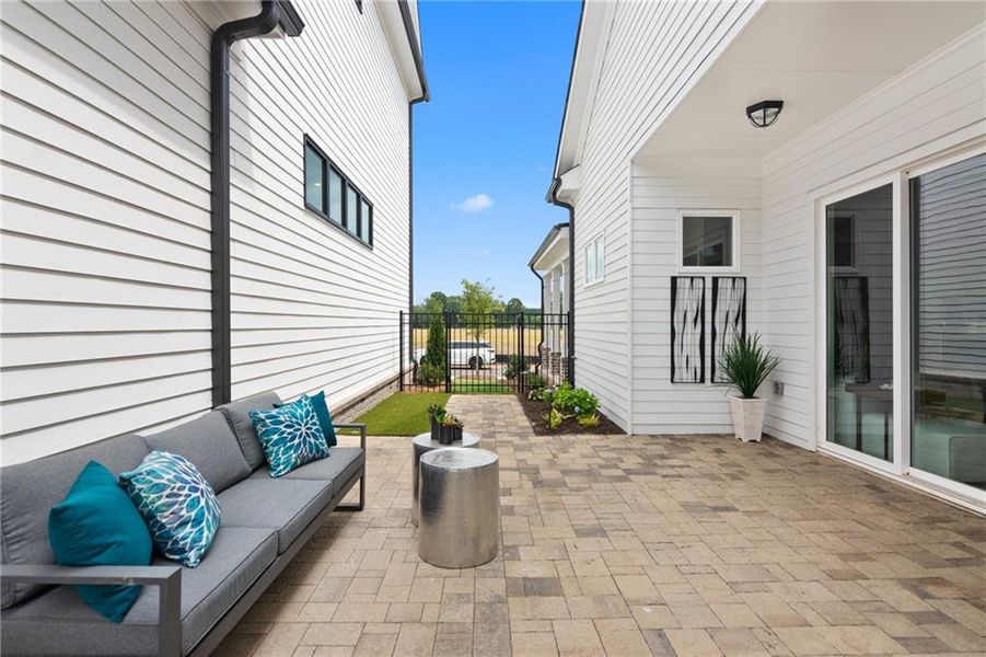 Exterior details and patio area of a home in Promenade at Sawnee Village, Cumming (Image 25). Exterior details and patio area of a home in Promenade at Sawnee Village, Cumming (Image 25).