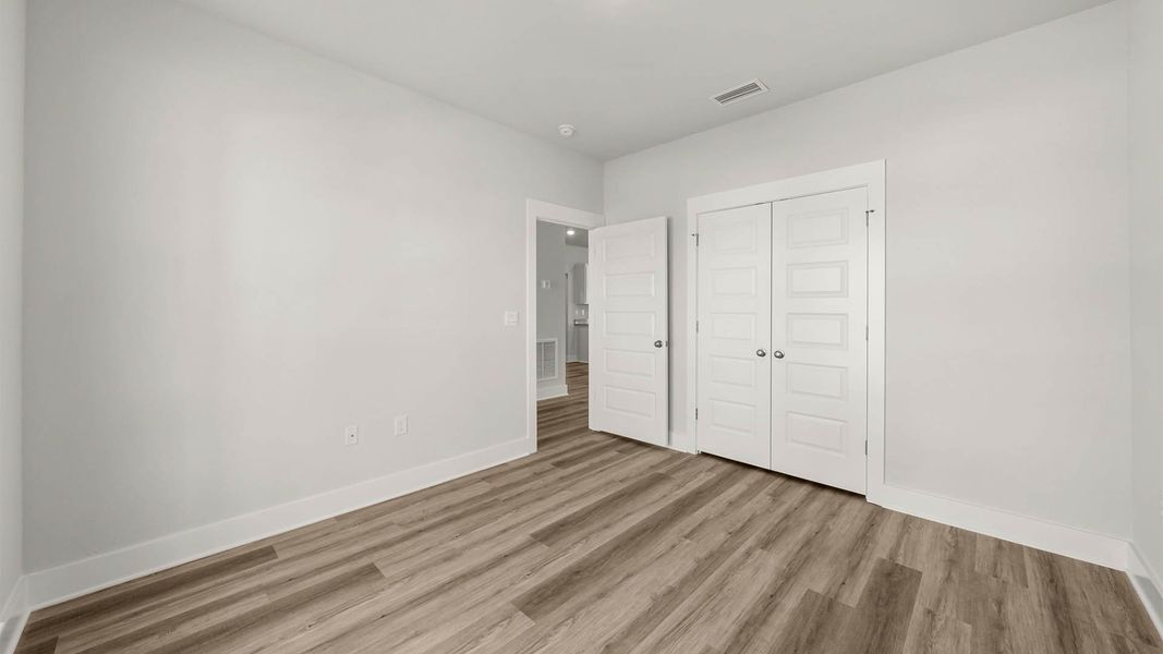 Spacious, unfurnished interior of a new home in WindMark Beach, Port Saint Joe (Image 26).